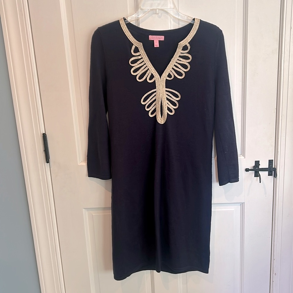 Lilly Pulitzer merino wool knit v-neck dress with gold ribbon trim.